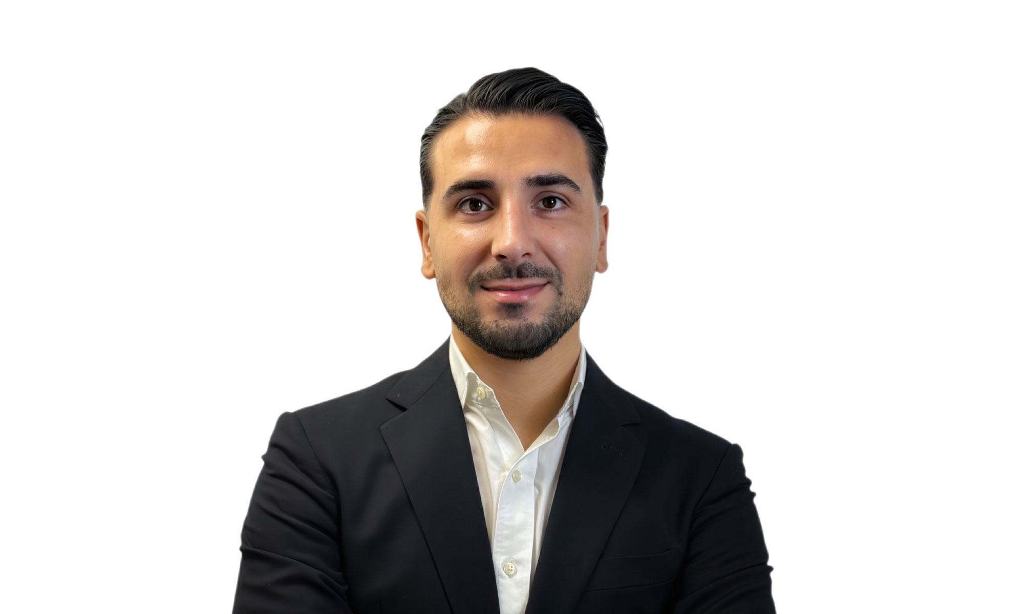 Porträtt av en man iklädd vit skjorta och mörk kavaj