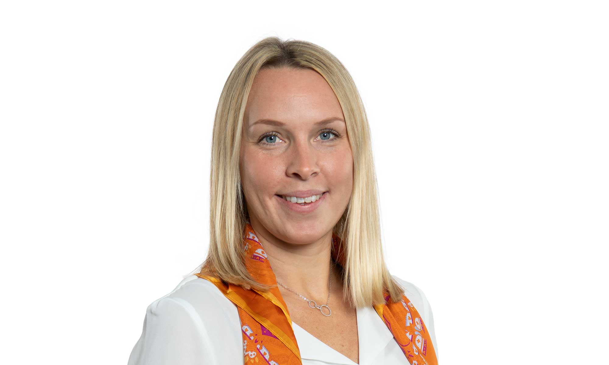 a women with blond hair dressed in a white shirt 